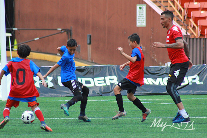 Jay Bothroyd. J1 League Soccer player playing soccer with Children